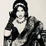 Приказчикова